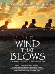 young men canoe forward
