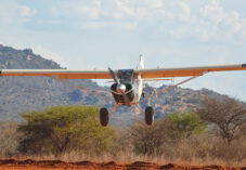 patrolling prop plane lands in the savannah in Kenyan national park
